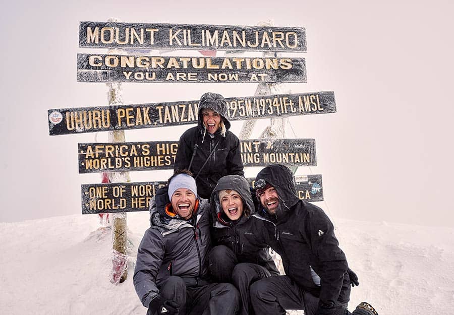 Mandy Moore celebrates with her friends atop Mount Kilimanjaro