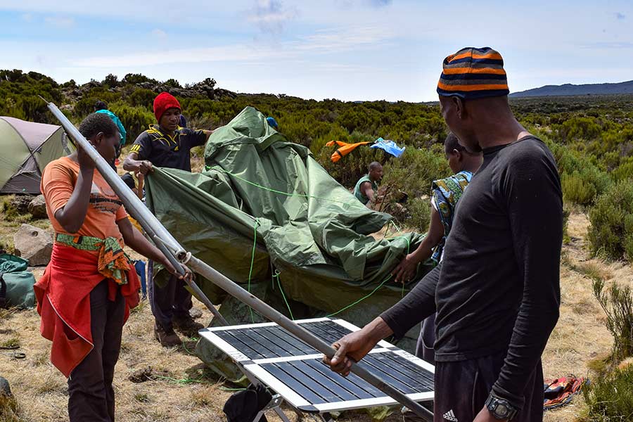 porters setting up tent